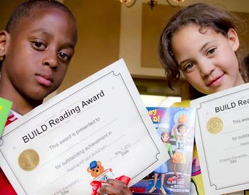 Young students with their BUILD reading awards