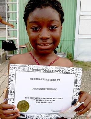 camper with her completion certificate